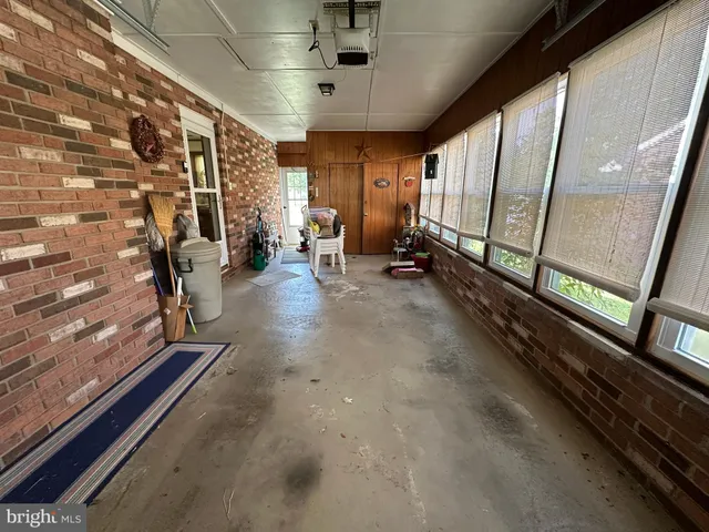 a bathroom with a sink toilet and mirror