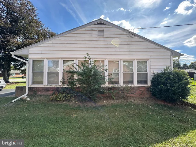 a view of a golf course with a lake