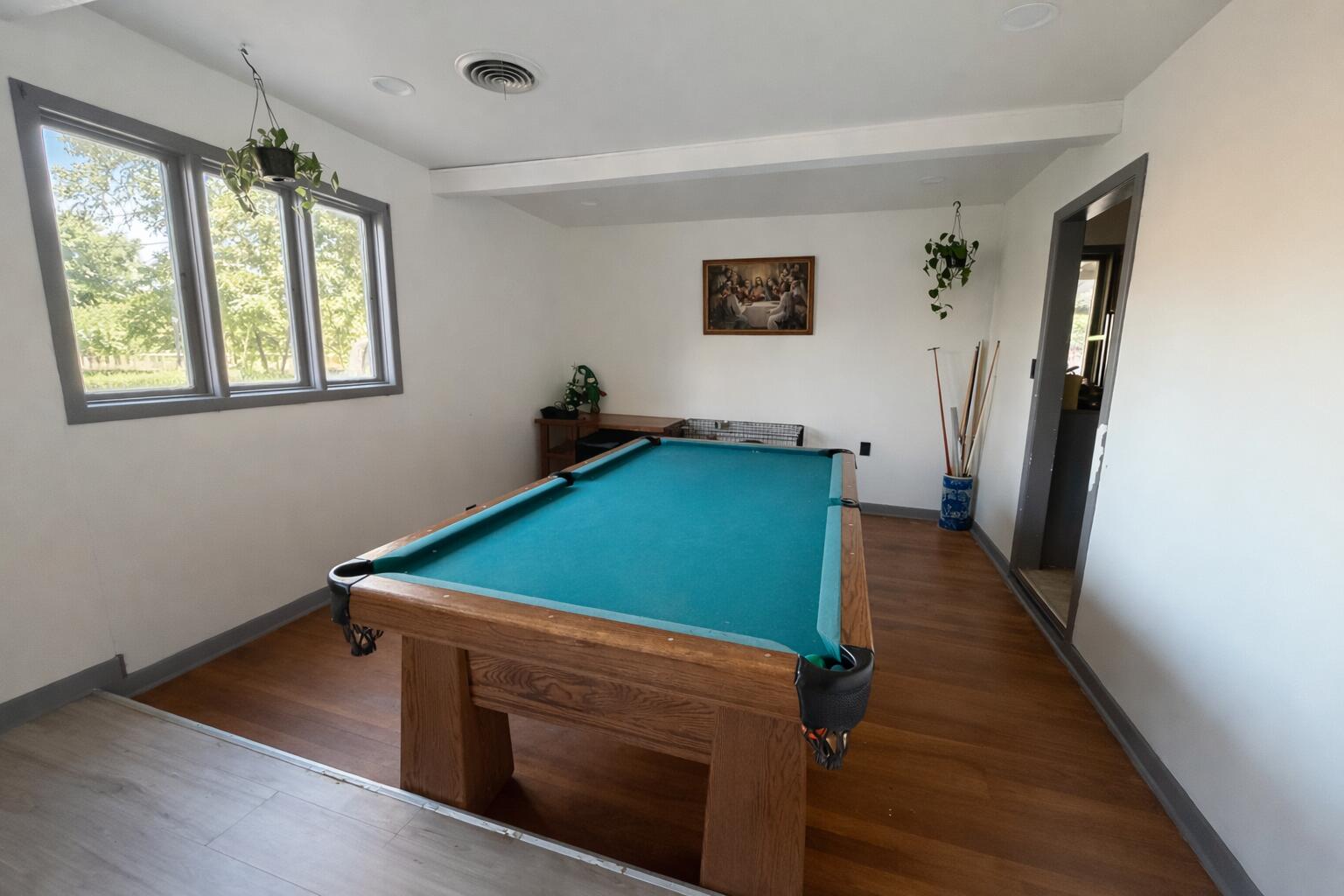 3404 42nd Street Lubbock, TX 79413 - Photo 3 of 12 a room with pool table and windows