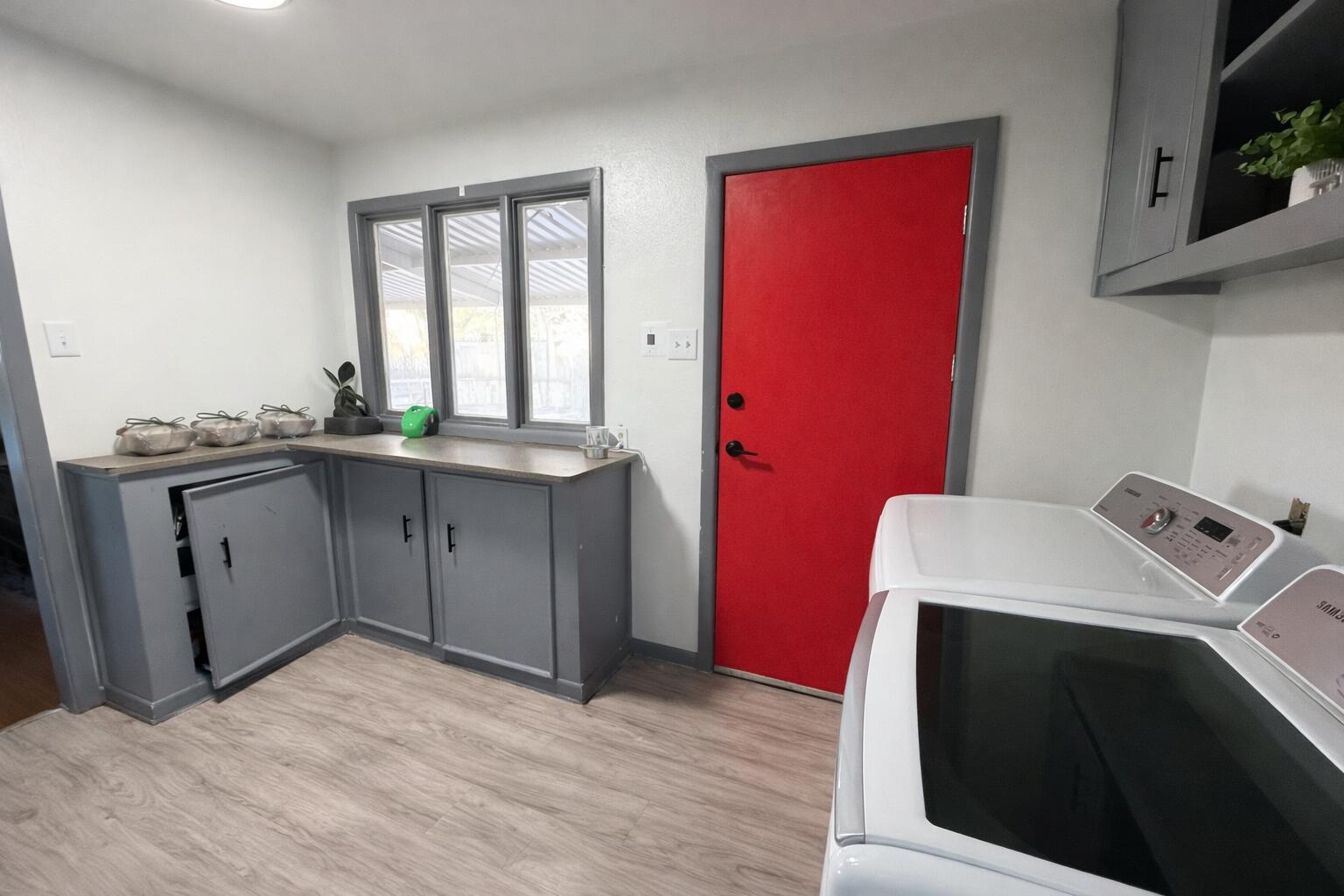 3404 42nd Street Lubbock, TX 79413 - Photo 5 of 12 a kitchen with a sink a stove and cabinets