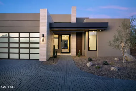 a backyard of a house with seating space
