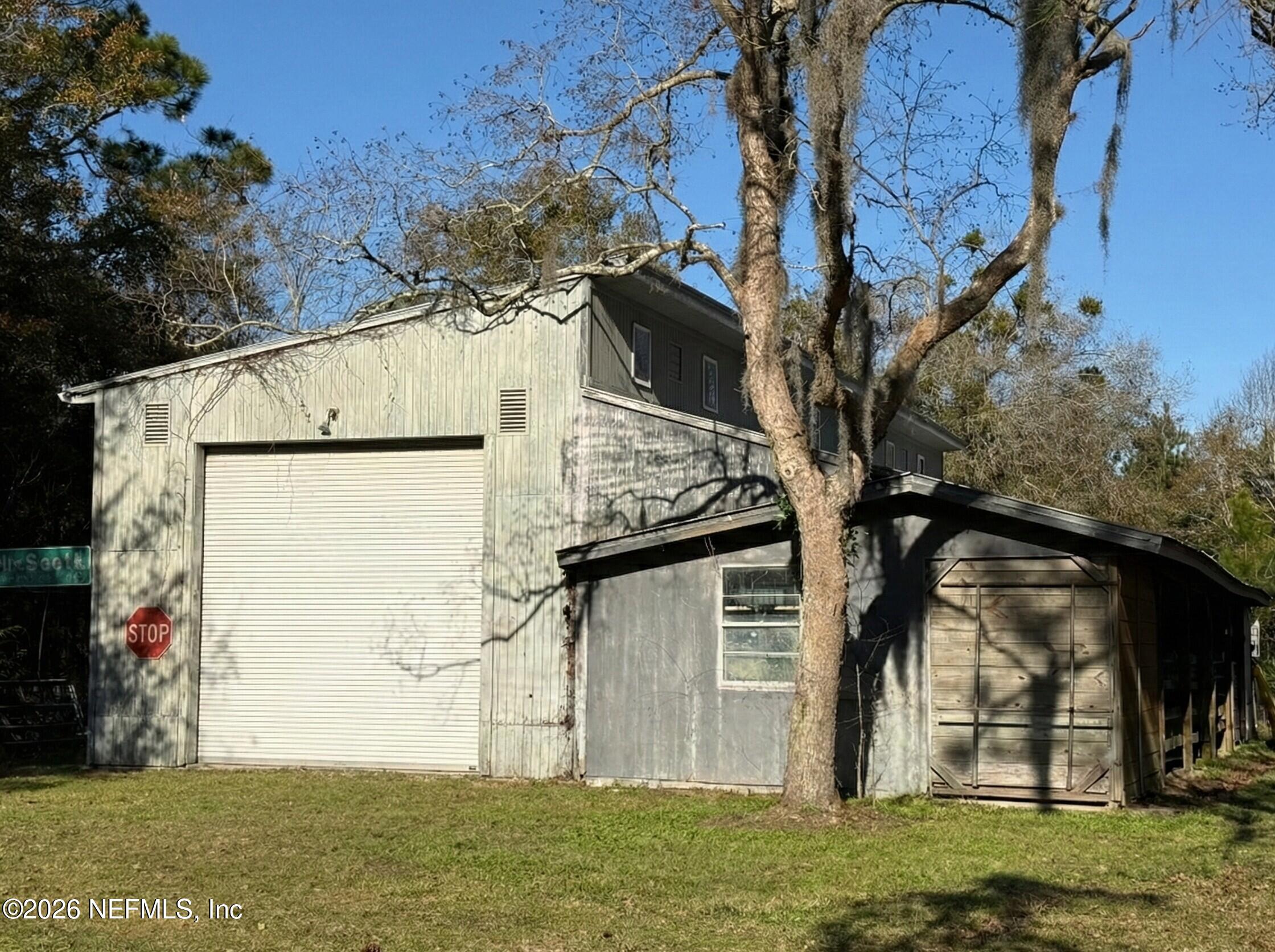 95291 Alligator Creek Road Fernandina Beach, FL 32034 - Photo 9 of 27 a view of a house with a yard