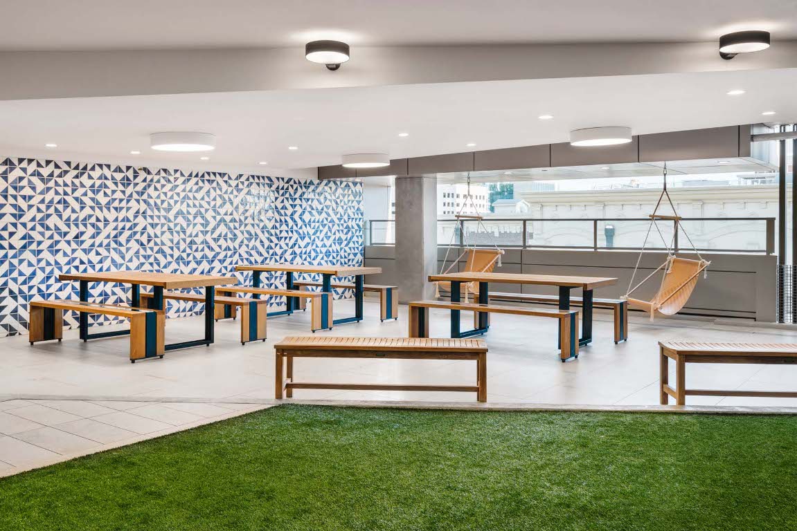 501 West Avenue, Unit 1802 Austin, TX 78701 - Photo 27 of 35 a living room with lots of furniture and clutter