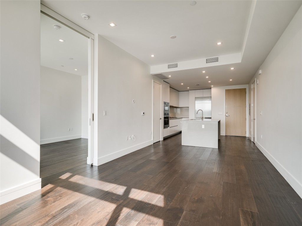 501 West Avenue, Unit 1802 Austin, TX 78701 - Photo 10 of 35 a view of a kitchen with wooden floor