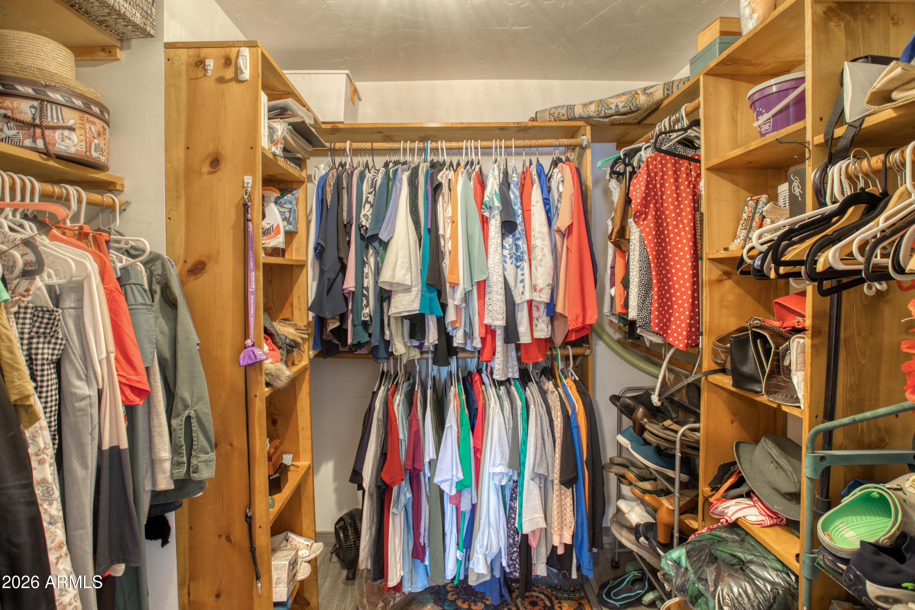 5 Co Road Show Low, AZ 85901 - Photo 20 of 39 a view of walk in closet with clothes