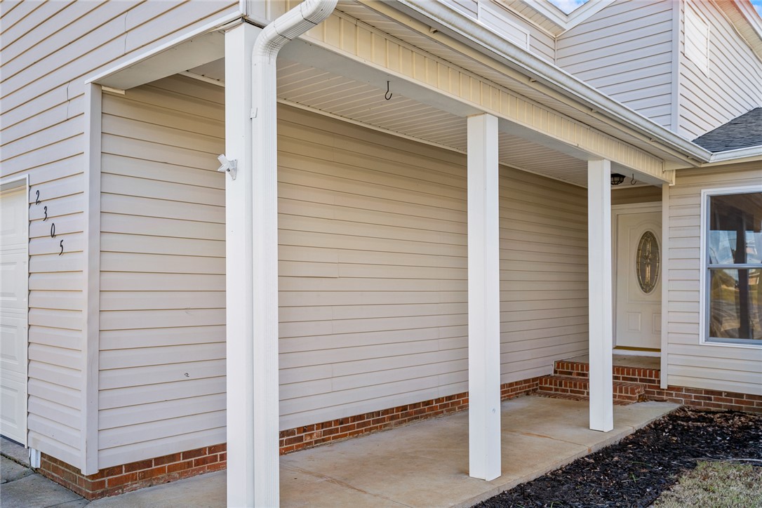 2305 Millgate Road Anderson, SC 29621 - Photo 2 of 18 A welcoming front entrance with ample covered space, ideal for greeting guests.