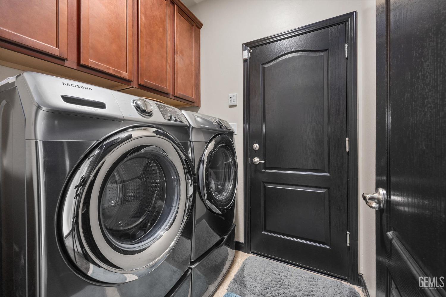 Undisclosed Address Bakersfield, CA 93313 - Photo 17 of 28 a utility room with dryer and washer