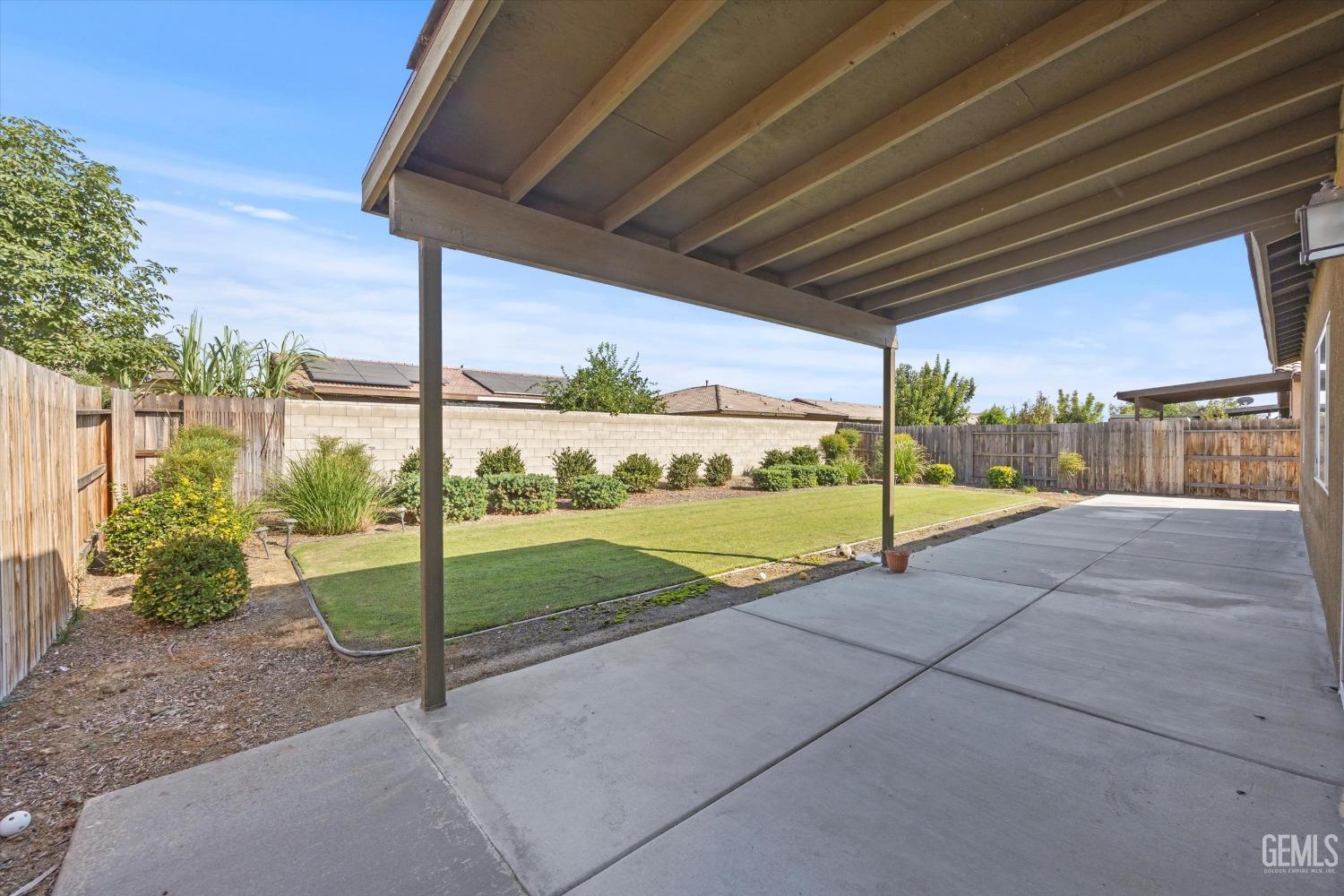 Undisclosed Address Bakersfield, CA 93313 - Photo 27 of 28 a view of a house with backyard