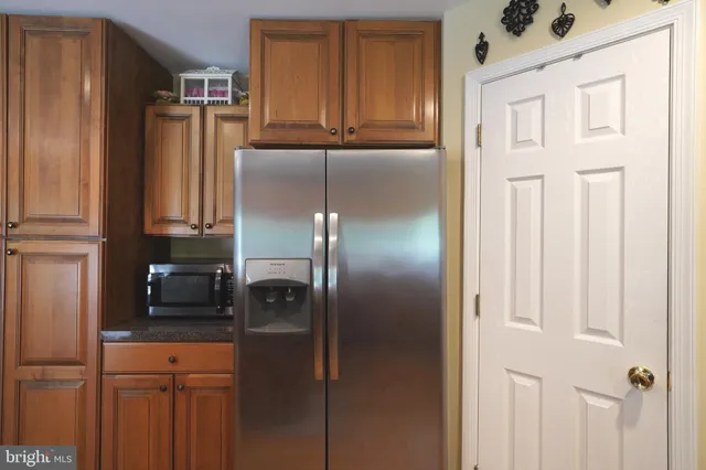 a bedroom with a bed and a table in it