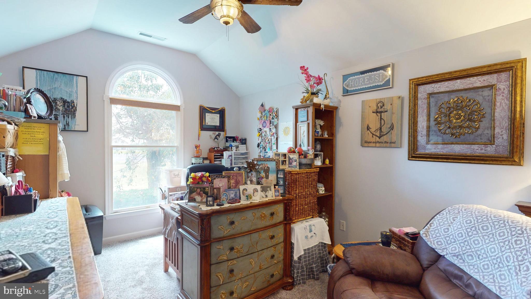 408 Laurens Way Queen Anne, MD 21657 - Photo 36 of 68 a living room with furniture and a window