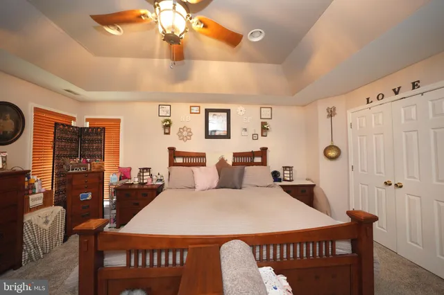 a view of a patio with couple of flower plants