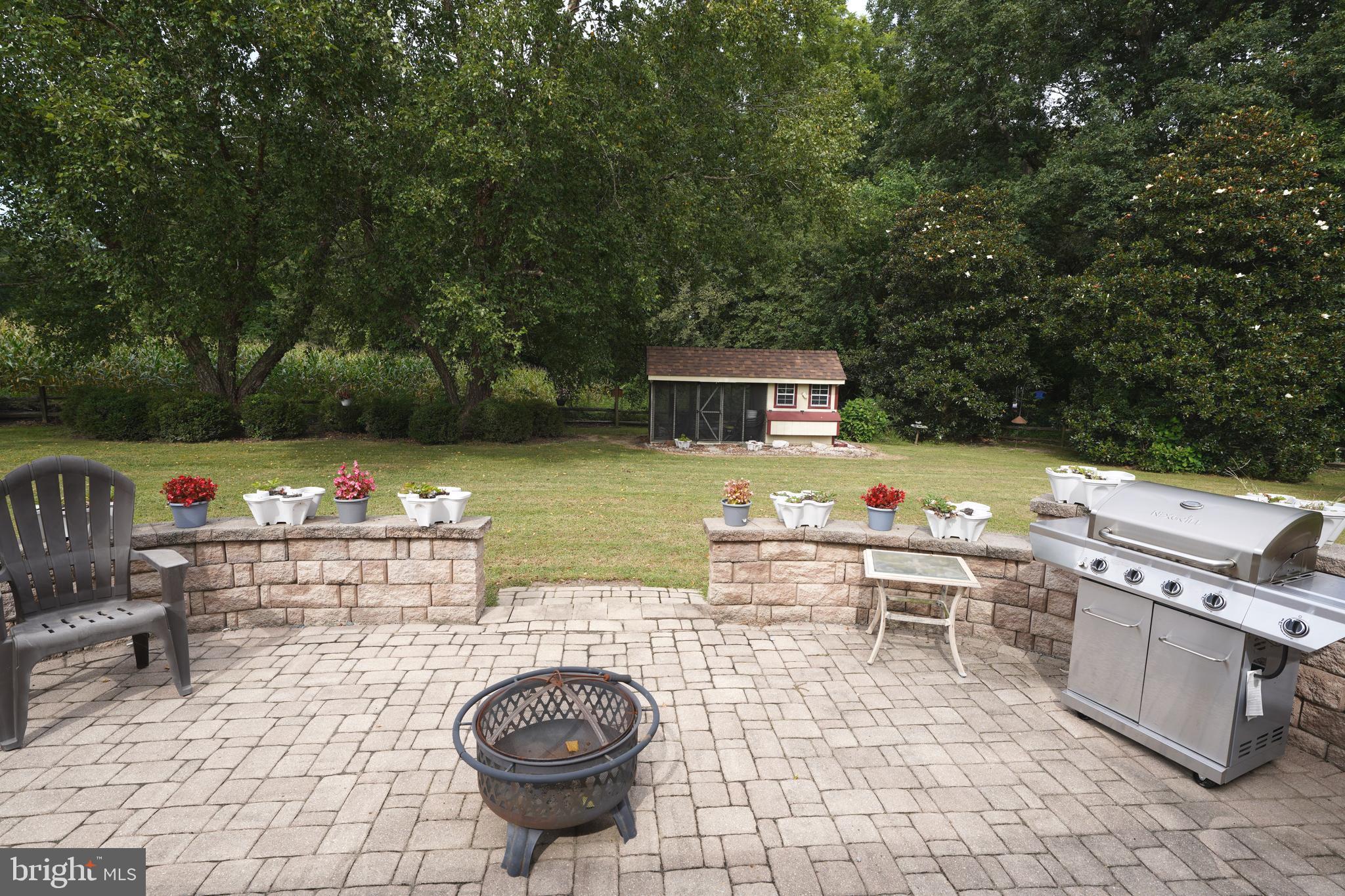 408 Laurens Way Queen Anne, MD 21657 - Photo 59 of 68 a view of a chairs and table in the patio