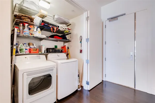 a view of a storage & utility room with washer and dryer