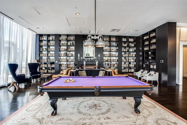 a view of swimming pool from a balcony