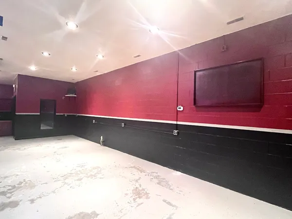 a kitchen with kitchen island a sink dishwasher and a microwave