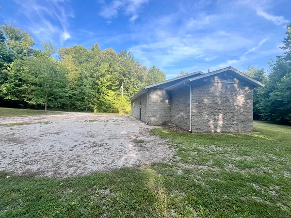 a backyard of a house with lots of green space
