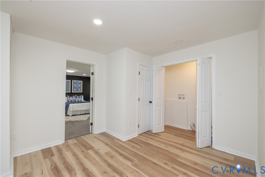5318 Pine Hill Road Sutherland, VA 23885 - Photo 15 of 50 a room that has a bed and cabinets