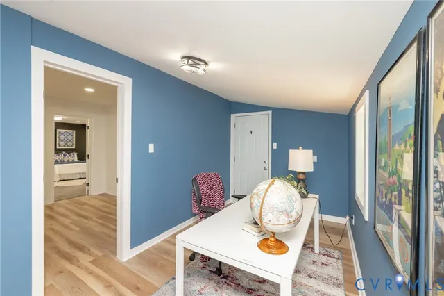 a view of living room with furniture and rug