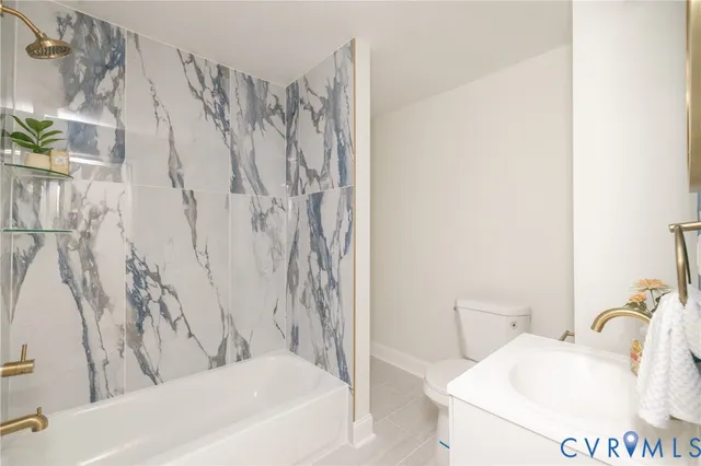 a bathroom with a sink and toilet