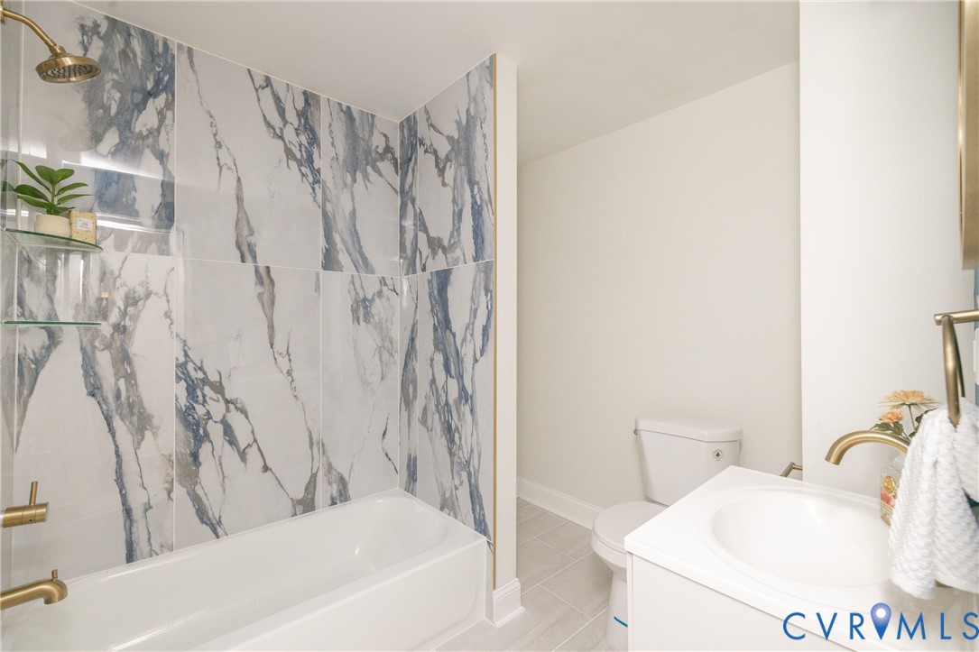 5318 Pine Hill Road Sutherland, VA 23885 - Photo 29 of 50 a bathroom with a sink and toilet