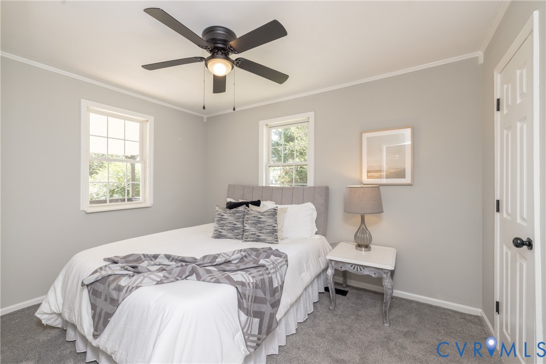 5318 Pine Hill Road Sutherland, VA 23885 - Photo 33 of 50 a bedroom with a bed and a window