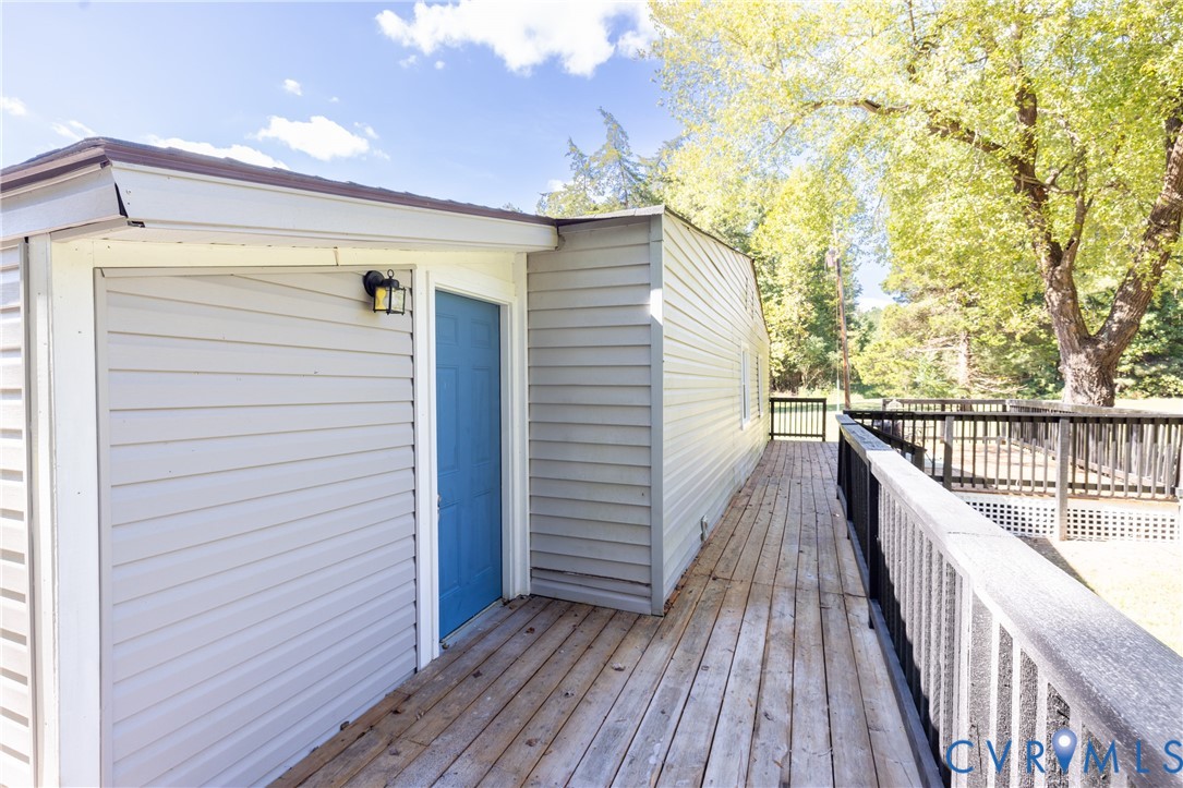 5318 Pine Hill Road Sutherland, VA 23885 - Photo 35 of 50 a view of balcony with wooden floor