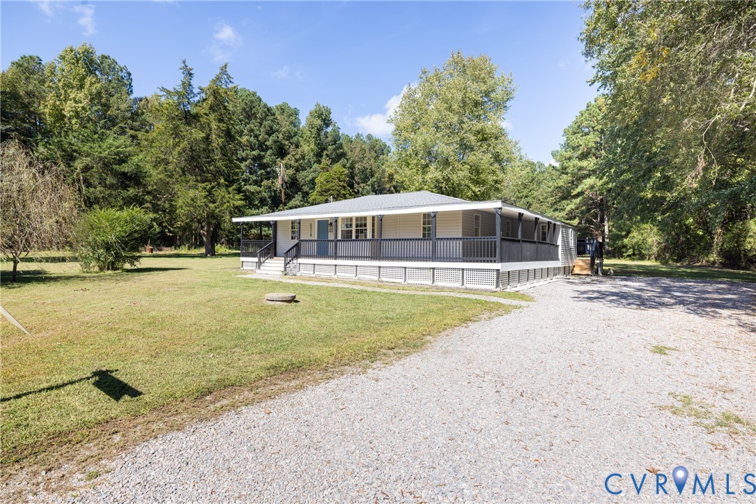 5318 Pine Hill Road Sutherland, VA 23885 - Photo 44 of 50 a view of a house with swimming pool