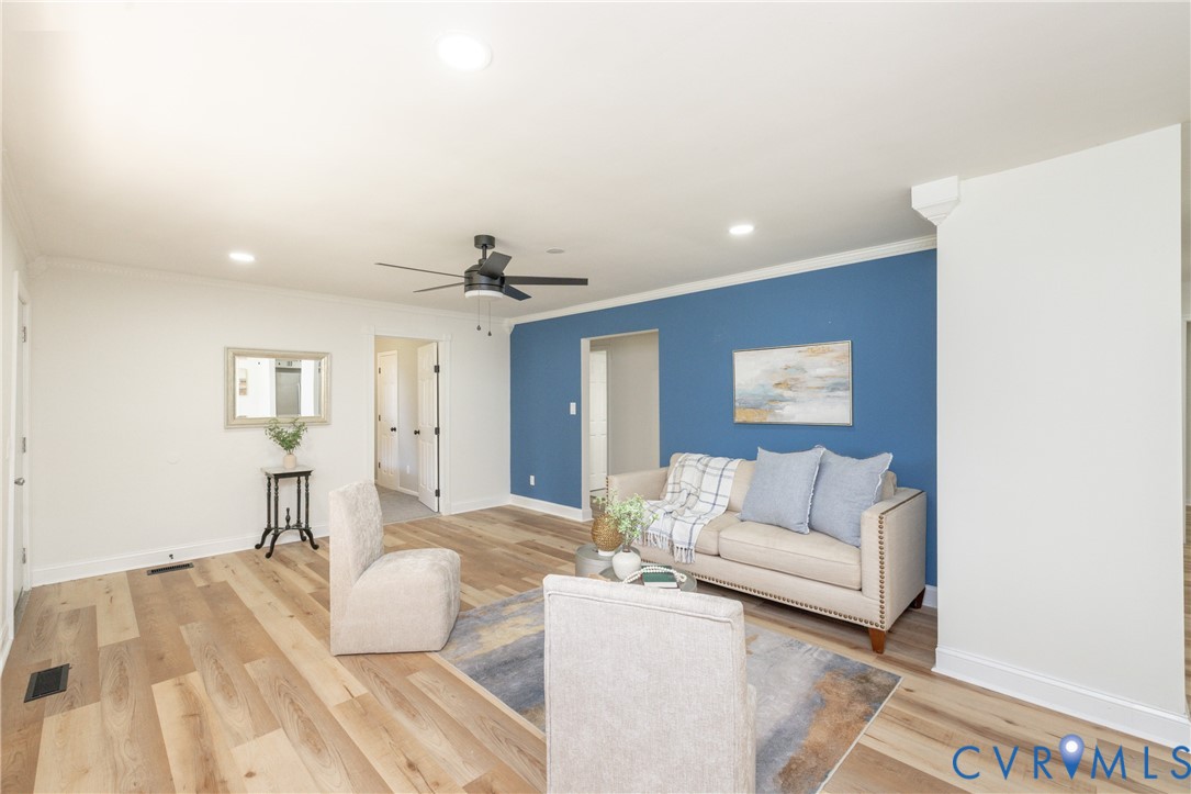 5318 Pine Hill Road Sutherland, VA 23885 - Photo 6 of 50 a living room with furniture and a wooden floor