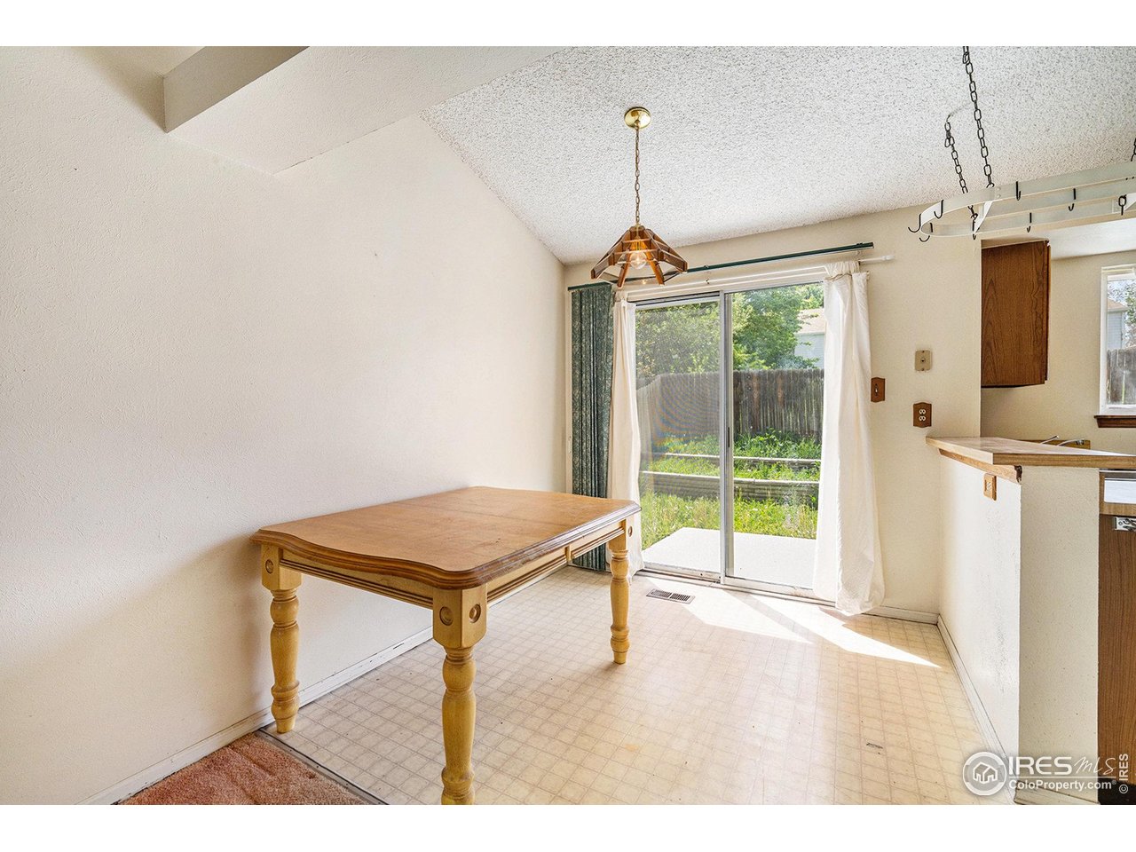 2167 Hackberry Circle Longmont, CO 80501 - Photo 6 of 23 a view of a room with window