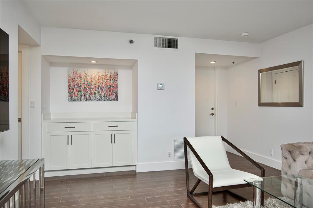 1612 Bridgewood Drive, Unit 1612 Boca Raton, FL 33434 - Photo 14 of 38 a workspace room with furniture and windows