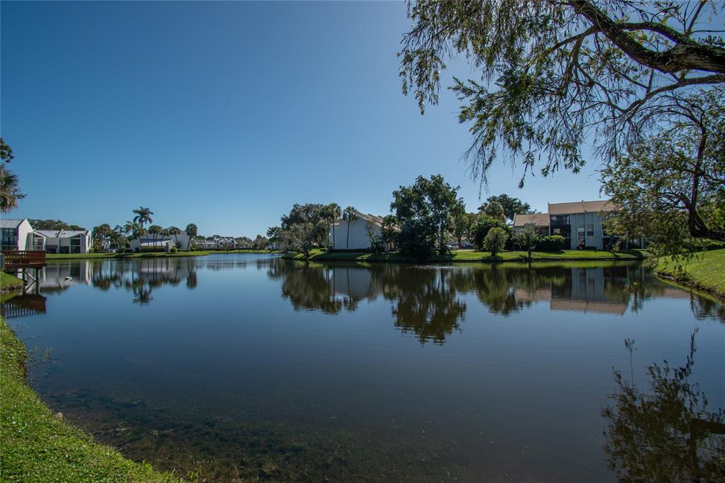 1612 Bridgewood Drive, Unit 1612 Boca Raton, FL 33434 - Photo 35 of 38 a view of lake
