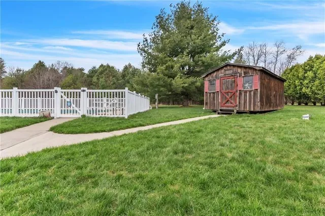 an aerial view of a house with a garden