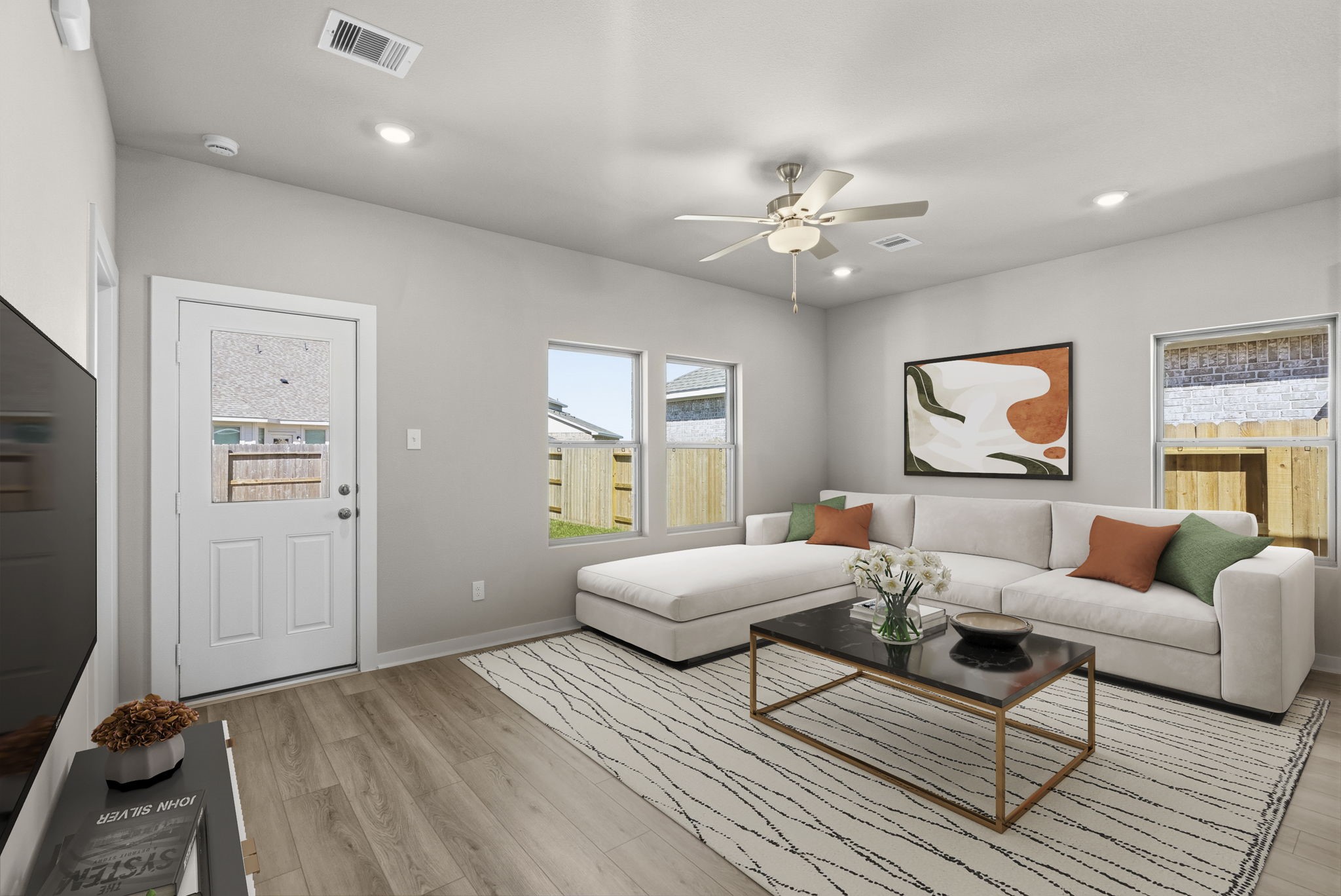3627 Atlas Pt Lane Angleton, TX 77515 - Photo 10 of 36 a living room with furniture and a flat screen tv
