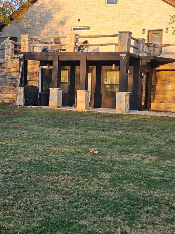 3626 Canyon Road Granbury, TX 76049 - Photo 2 of 21 a view of a house with a garden