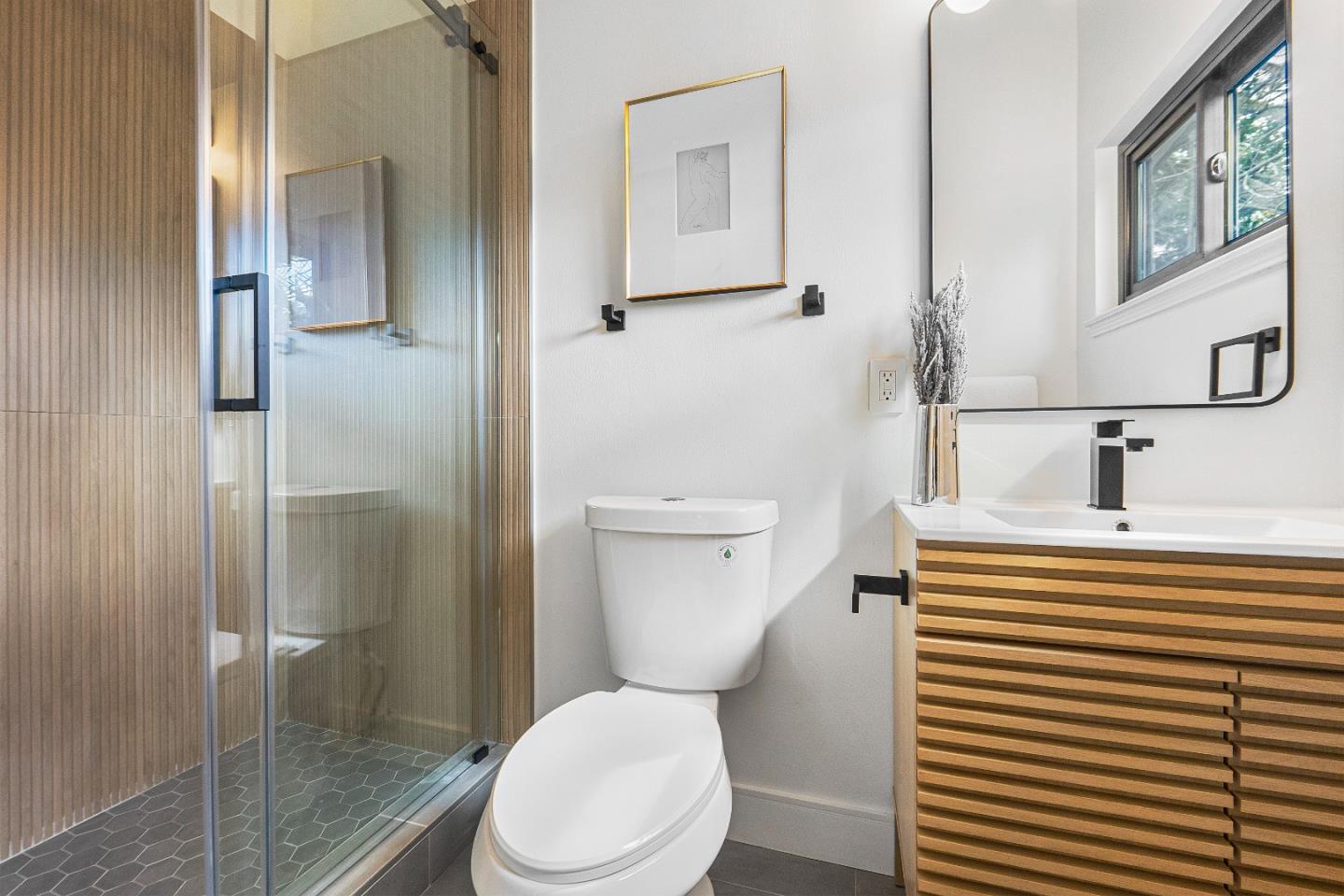 369 Ruth Avenue Mountain View, CA 94043 - Photo 20 of 33 a bathroom with a sink a toilet and shower