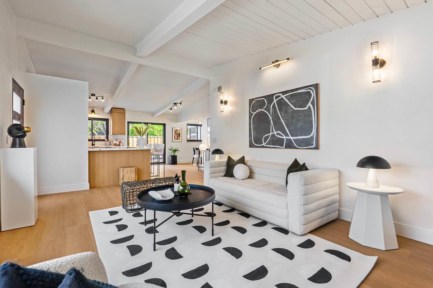 369 Ruth Avenue Mountain View, CA 94043 - Photo 2 of 33 a living room with furniture and wooden floor