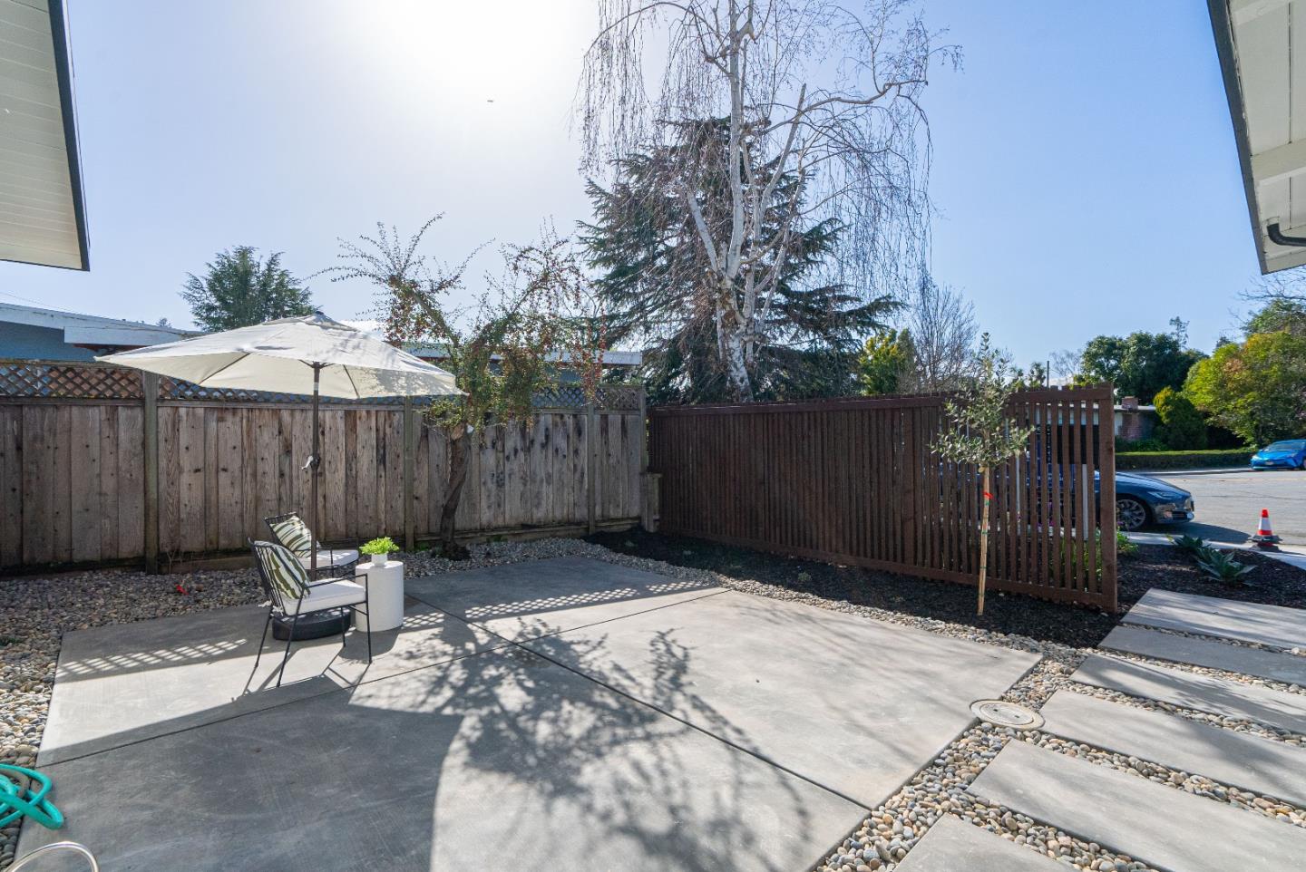 369 Ruth Avenue Mountain View, CA 94043 - Photo 25 of 33 a view of a backyard with a table and chairs
