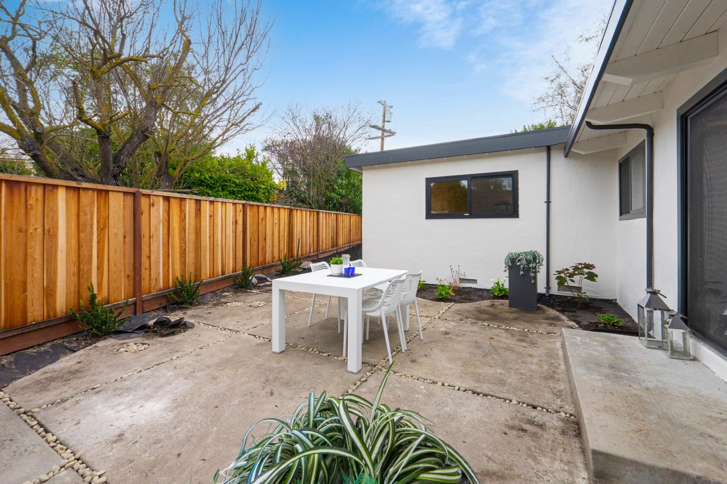 369 Ruth Avenue Mountain View, CA 94043 - Photo 26 of 33 a backyard of a house with table and chairs