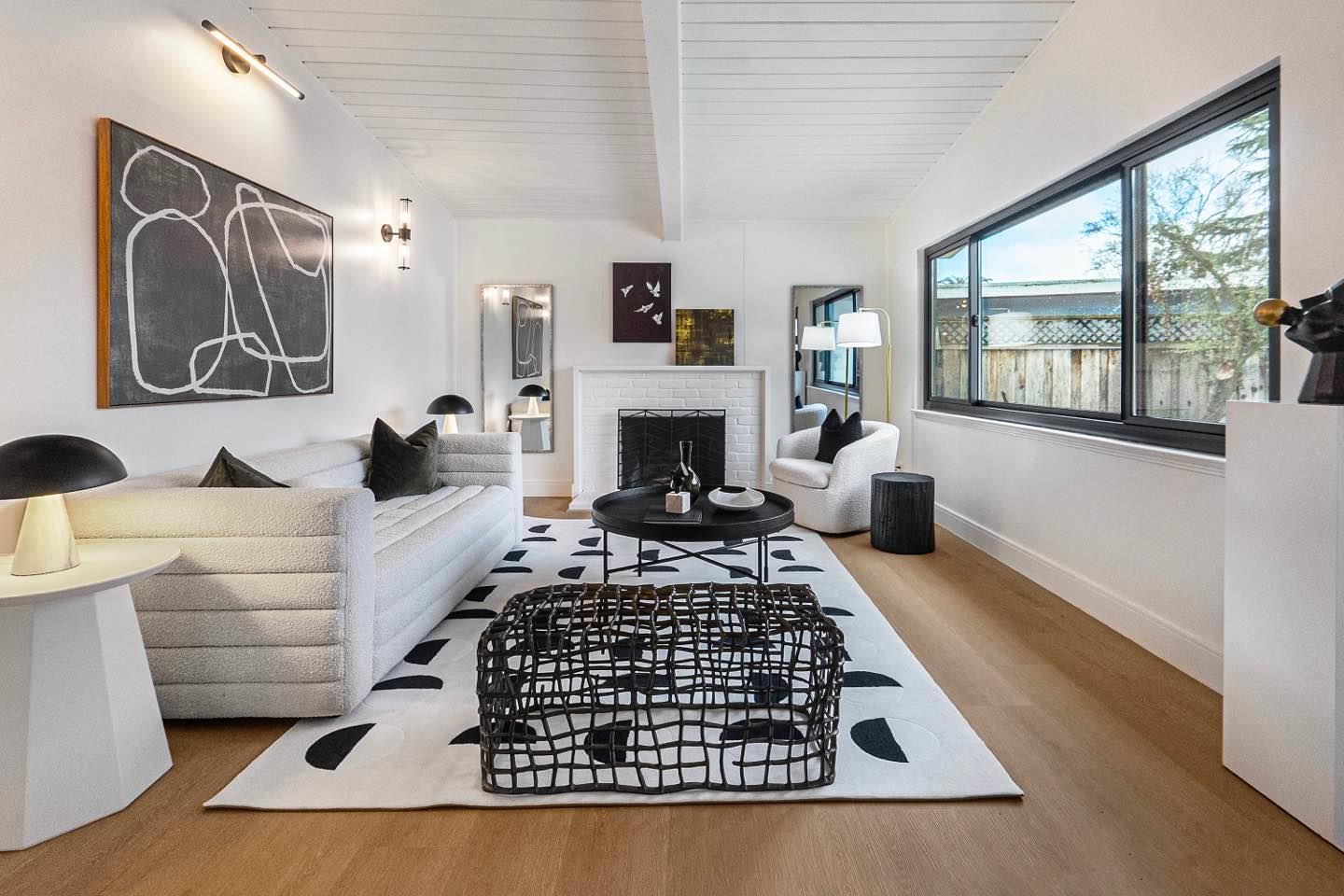 369 Ruth Avenue Mountain View, CA 94043 - Photo 3 of 33 a living room with furniture and a fireplace