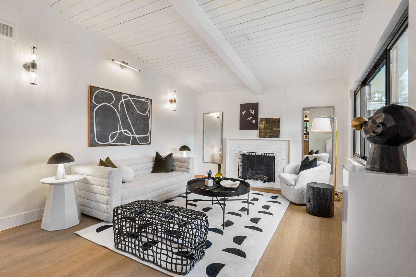 369 Ruth Avenue Mountain View, CA 94043 - Photo 4 of 33 a living room with furniture a fireplace and a flat screen tv