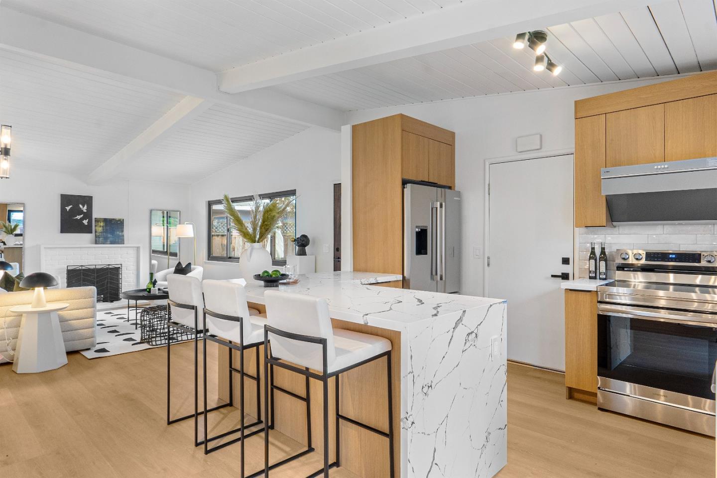 369 Ruth Avenue Mountain View, CA 94043 - Photo 6 of 33 a living room with stainless steel appliances kitchen island granite countertop furniture and a fireplace