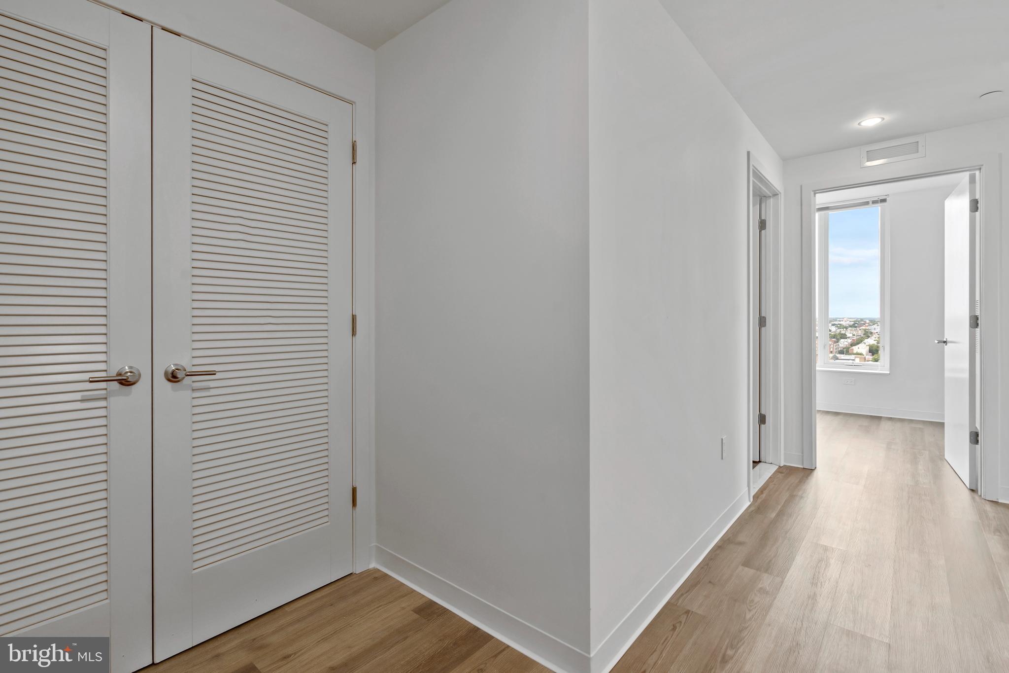 569 North 5th Street, Unit 723 Philadelphia, PA 19123 - Photo 14 of 49 a view of a hallway with wooden floor