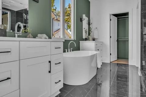 a bathroom with a sink and mirror