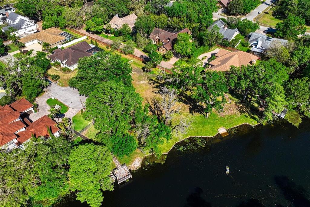 7810 Terrace Oaks Court Temple Terrace, FL 33617 - Photo 10 of 18 an aerial view of a houses with yard