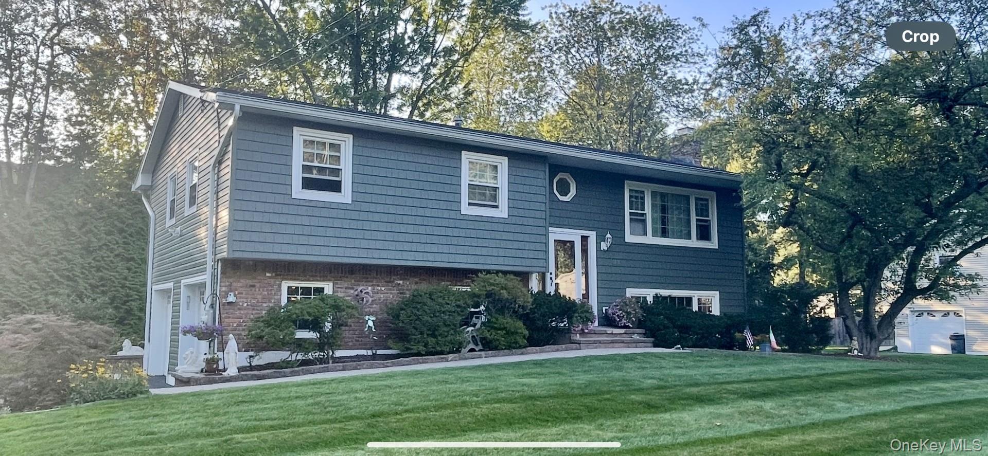 27 Farmhouse Road Congers, NY 10920 - Photo 1 of 1 Bi-level home featuring a front lawn, vinyl siding