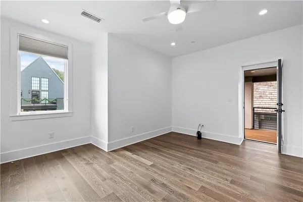 a view of a hallway with washer and dryer