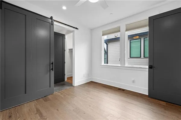 a building with trees in the background