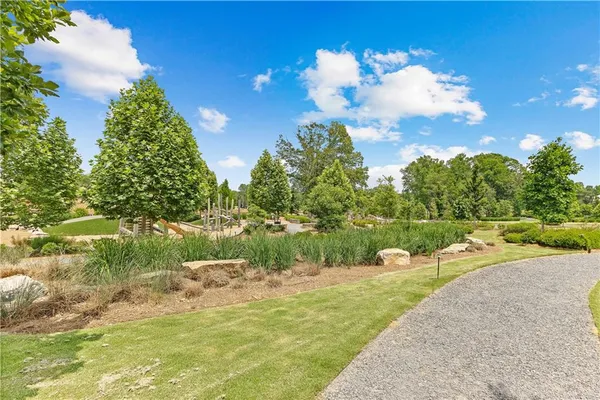 a row of houses on the side of street