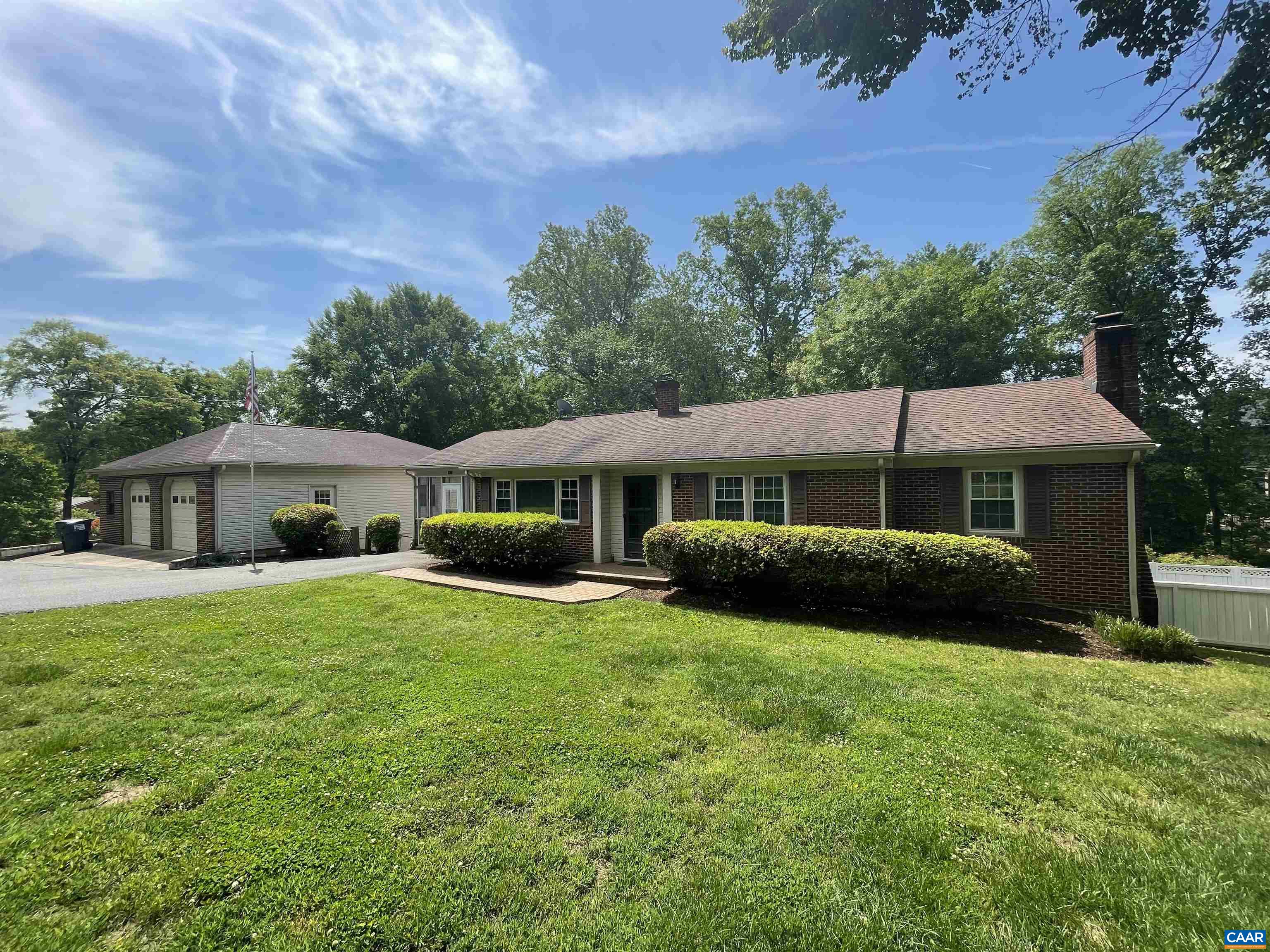 3515 Richmond Road Keswick, VA 22947 - Photo 2 of 47 a front view of a house with a garden