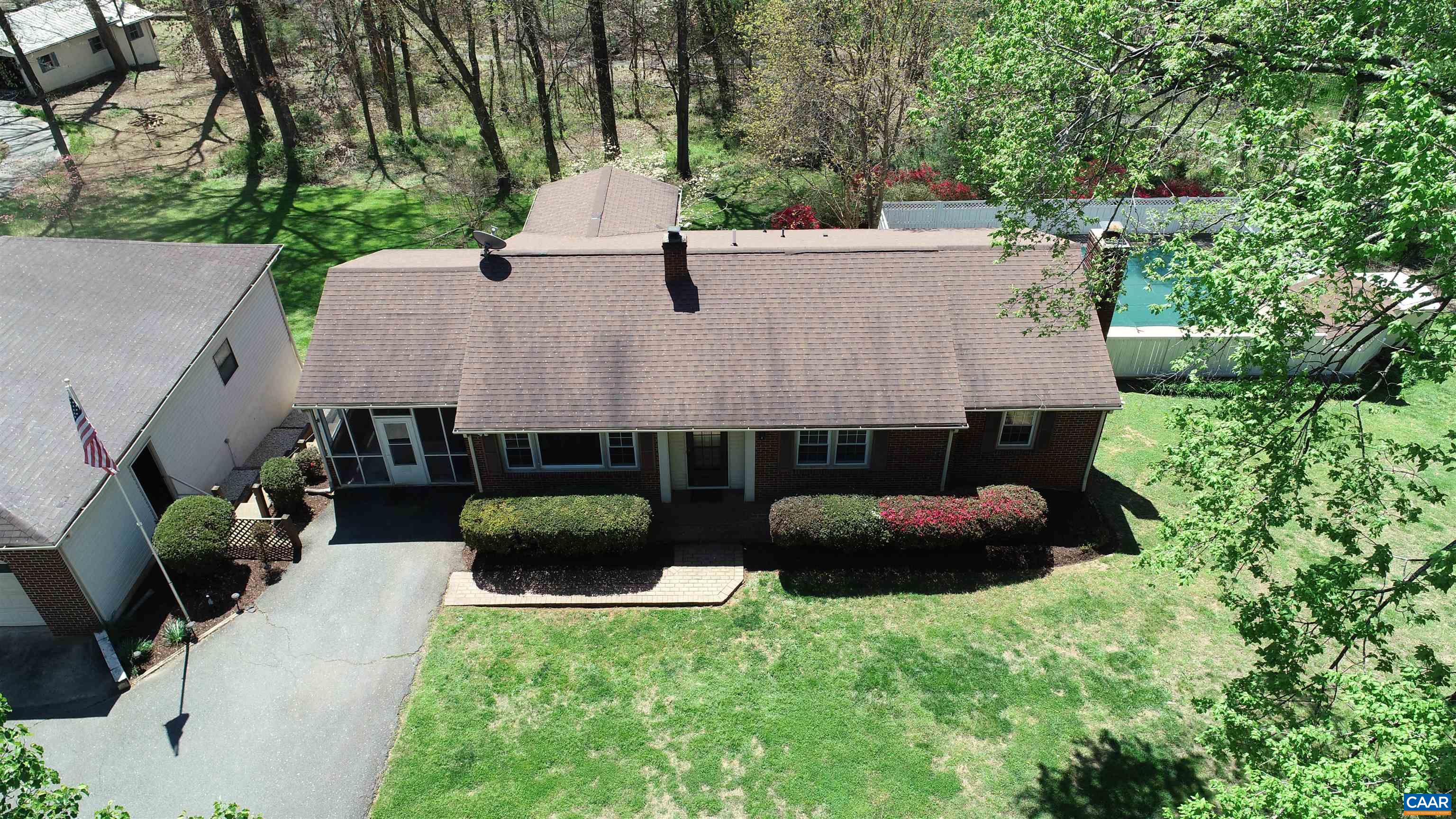 3515 Richmond Road Keswick, VA 22947 - Photo 38 of 47 an aerial view of a house with swimming pool and large trees